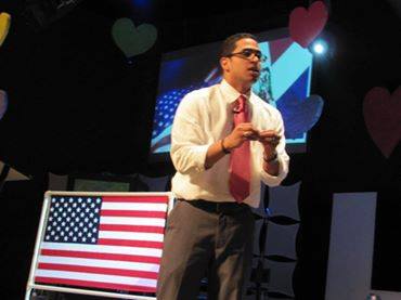 Dr. Engers presenting with American flag